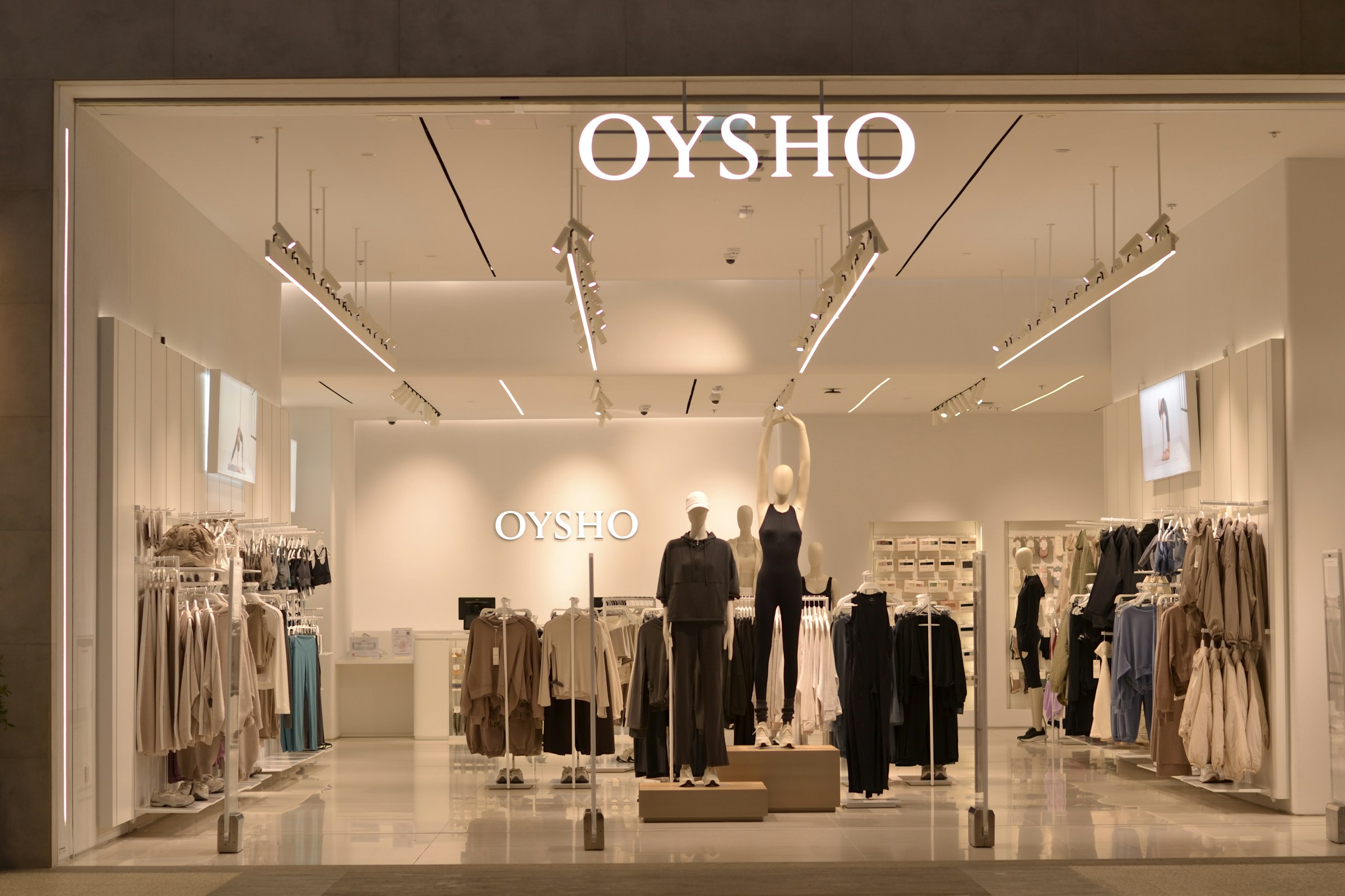 Bright OYSHO clothing store interior